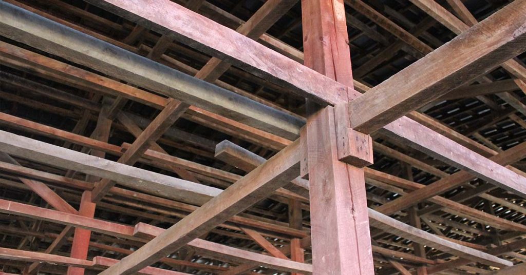 Cross beams inside the wooden barn
