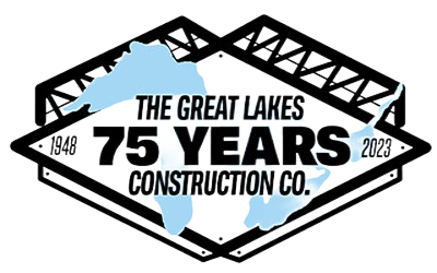 The Great Lakes Construction Co. logo with a black graphic of a bridge around it