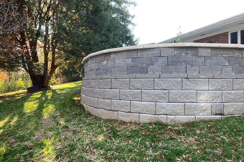 https://buildingvalue.org/wp-content/uploads/2024/02/hardscaping-retaining-wall-800x533-1.jpg